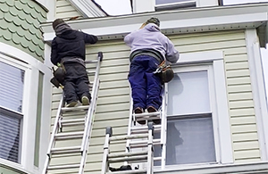 Mario Contracting installing soffit and fascia