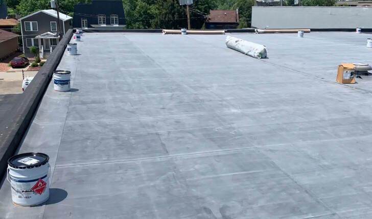 Mario Contracting installing rubber roof