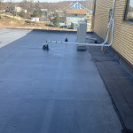 Photo of commercial rubber roofing job