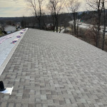 Photo of shingle roofing job