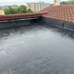 Photo of commercial rubber roofing project